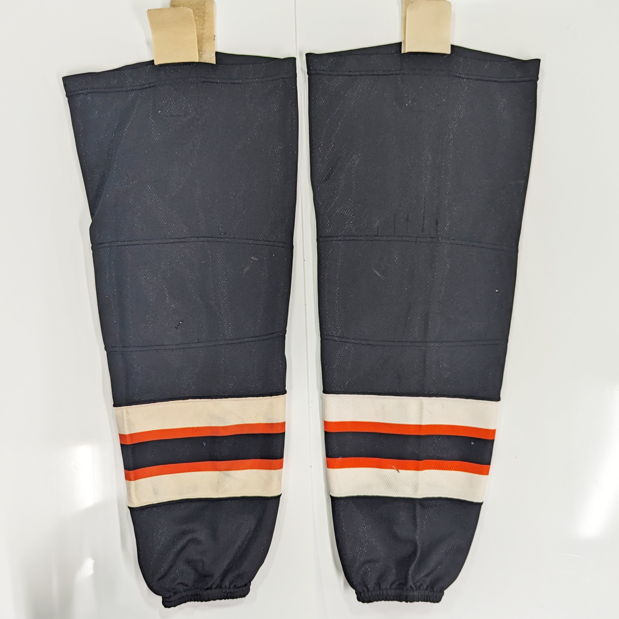 NCAA - Used Hockey Socks (Black/Orange/White)